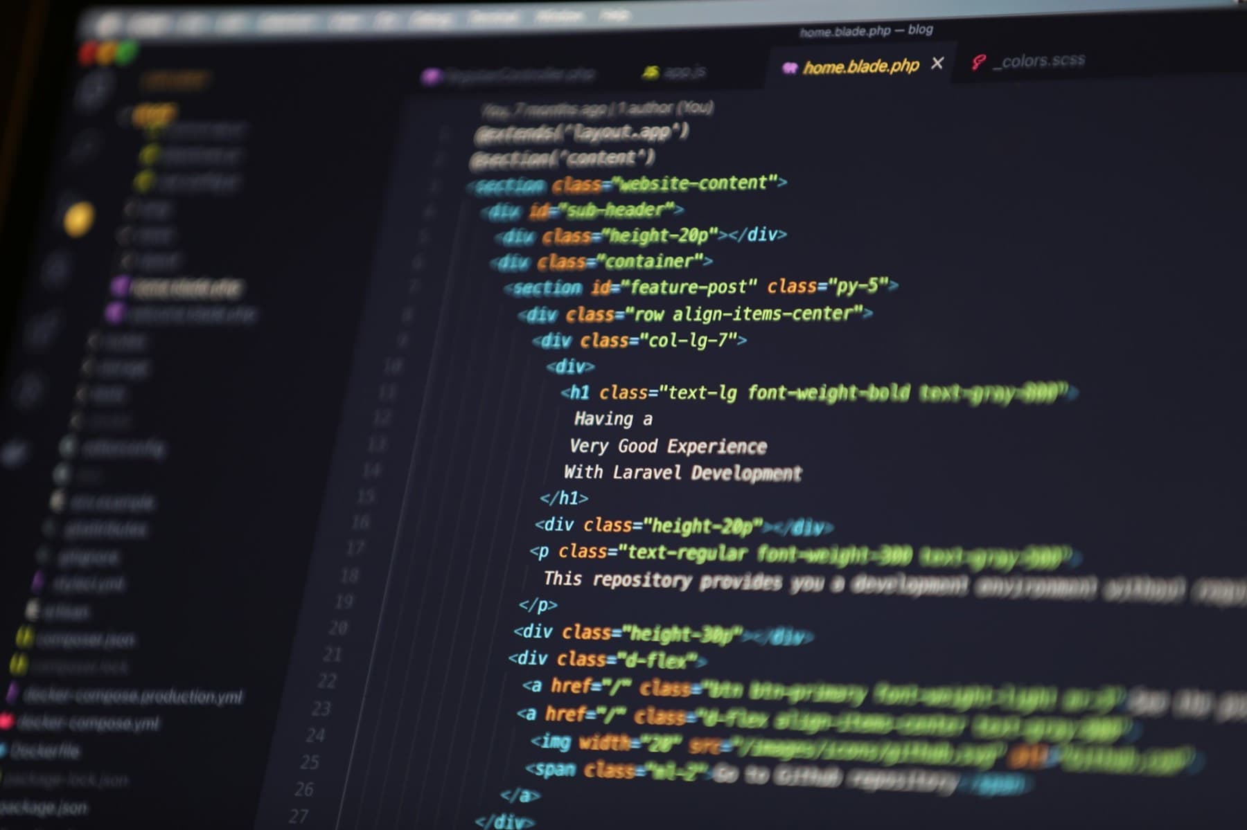 Computer screen displaying HTML for web development