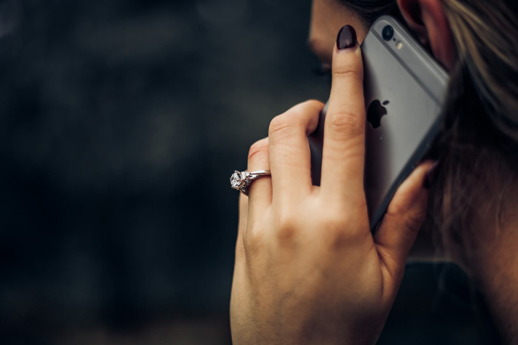 Woman talking on an iPhone